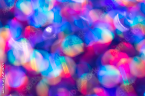 Rainbow blue glitter festive background with bokeh lights. Celebration concept for Holidays and anniversary.