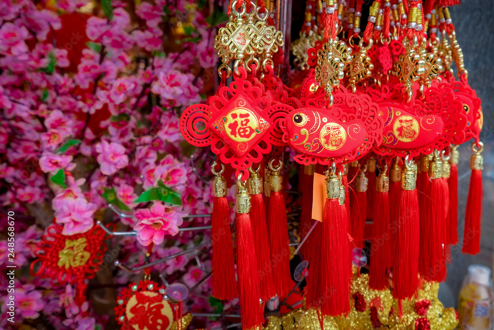 Souvenirs, gift and accessory decoration for Chinese New Year. Traditional Chinese golden Lucky knot Celebration for Happy new year 2019