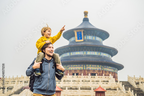 Photography Dad and son travelers in the Temple of Heaven in Beijing