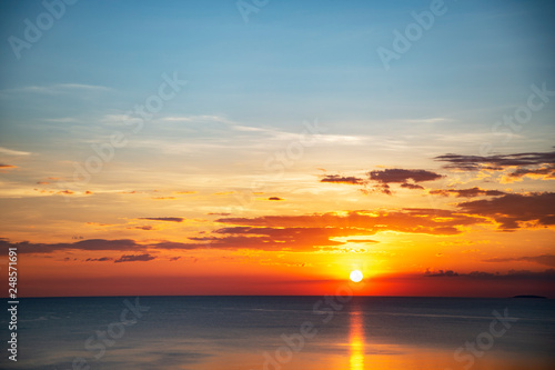 summer light cloudy blue sky at sunset on the sea coast for travel and vacation background