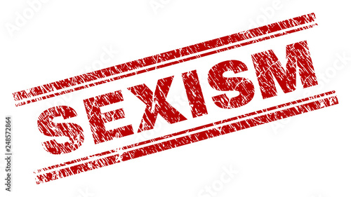 SEXISM seal print with distress texture. Red vector rubber print of SEXISM title with dirty texture. Text title is placed between double parallel lines.