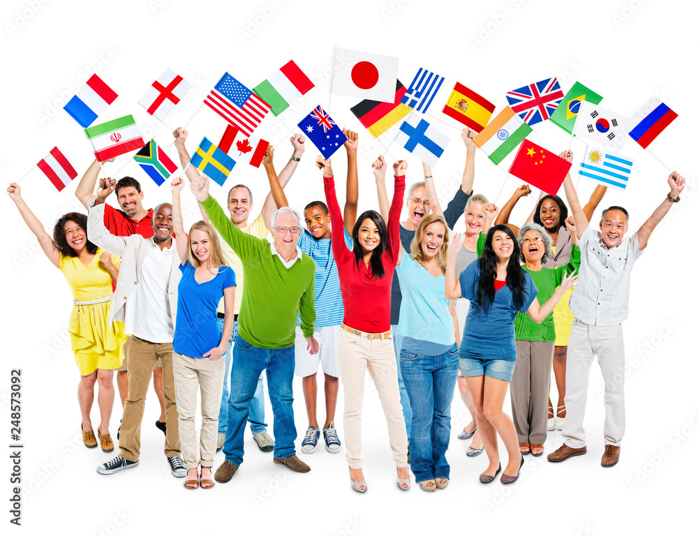 Obraz premium Cheerful Multi-Ethnic Group Of People Standing With Their Arms Raised Holding World Flags.