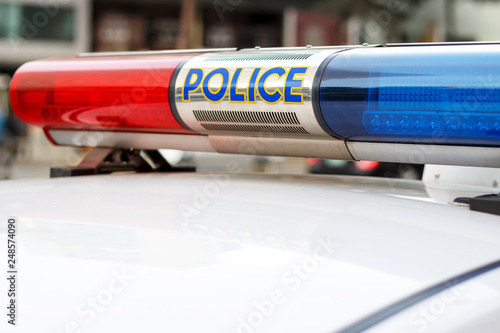 flashing lights of the police car front view close-up