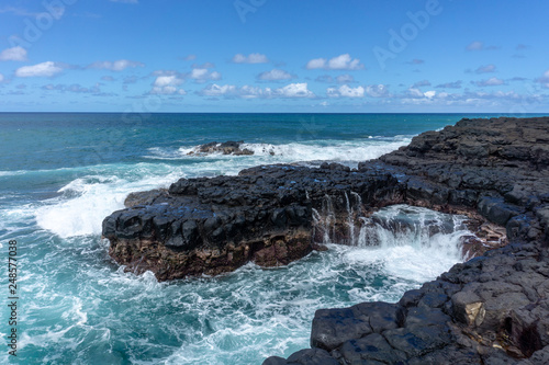 waves crashing on rocks