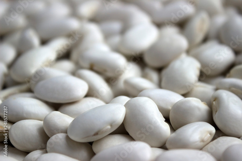 Lots of white large beans, background. Useful legumes