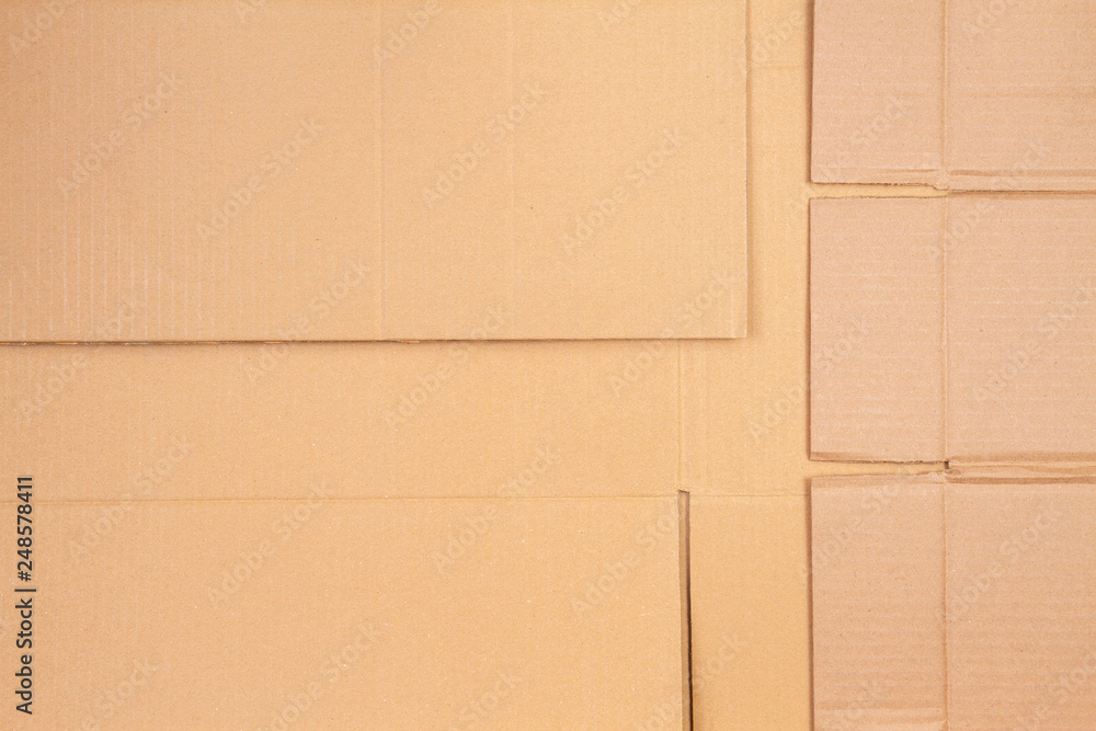 Old used corrugated striped cardboard boxes parts background Old used corrugated striped cardboard boxes parts background
