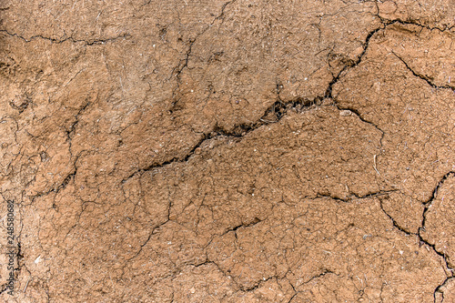 Cracked mud wall Peruvian home