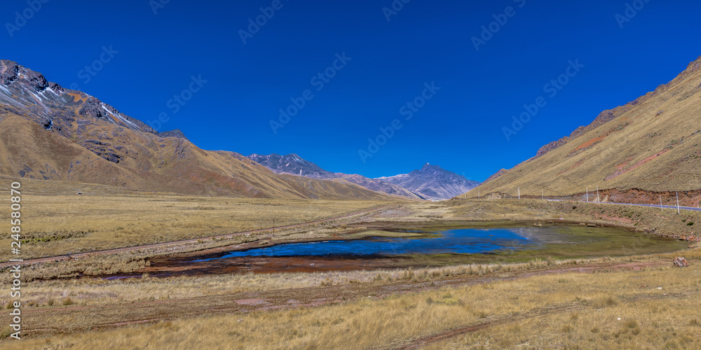 Small lake on the pass in the Andes