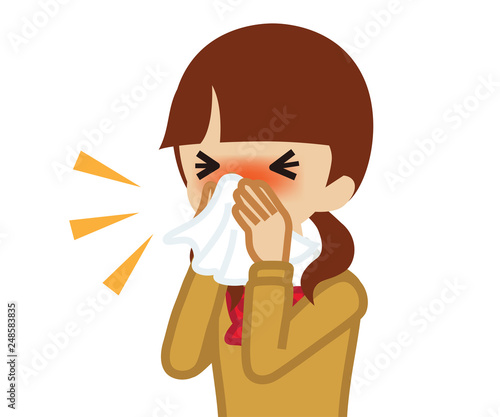Female student blowing nose with a tissue