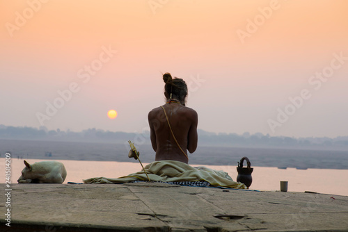 yogi on the banks of the Ganges india varanasi photo