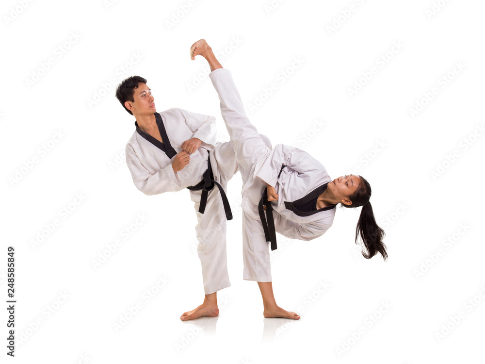 Young male and female taekwondo masters sparring session Young male and female taekwondo masters sparring session