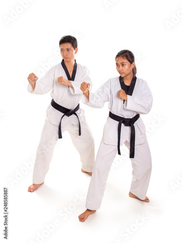 Male and female fighters in action together