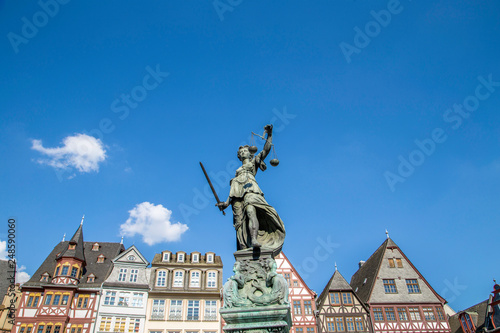 Justitia (Lady Justice) sculpture on the Roemerberg square in Frankfurt