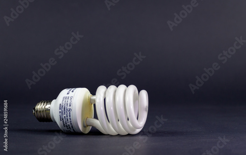 A lightbulb od dark bacground