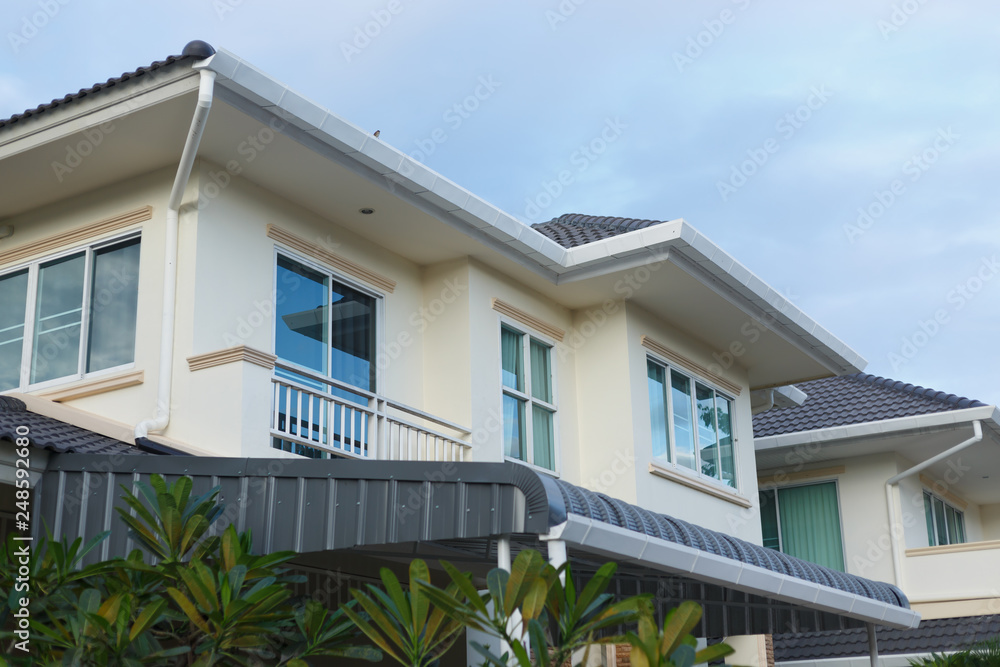 roof gutter on residential house building