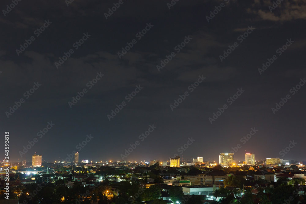 Fototapeta premium landscape city night with dramatic moody dark sky