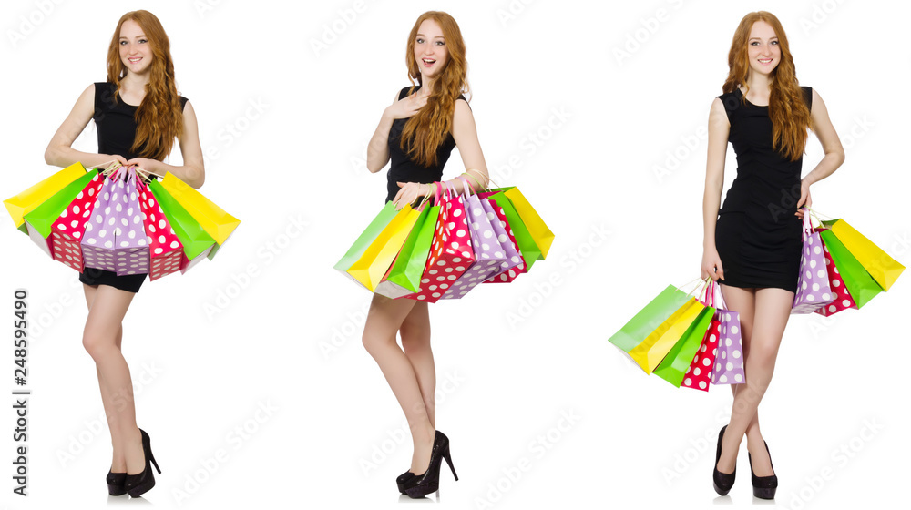 Young woman wth bags in shopaholic concept