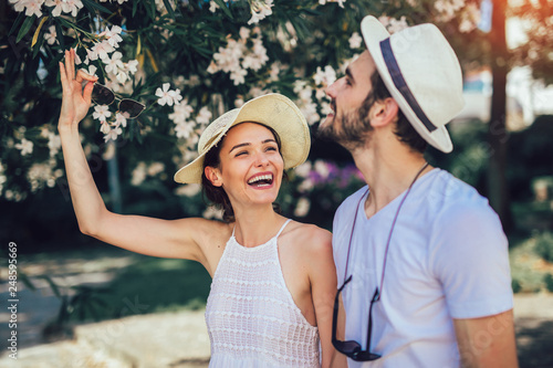 Couple in love. Romantic couple enyojing in moments of happiness in the city park. Love and tenderness, dating, romance. photo