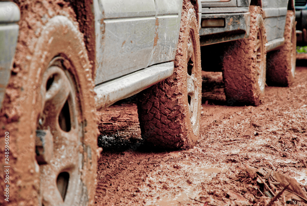 wheels of Off road vehicles with mud