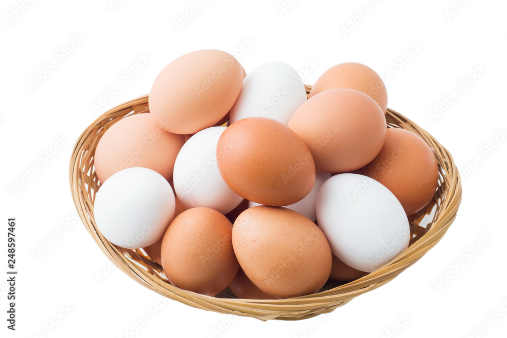 Chicken eggs in basket on isolated white background. Chicken eggs in basket on isolated white background.