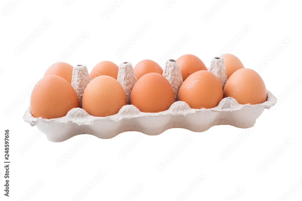 Chicken eggs in carton box isolated on white background.