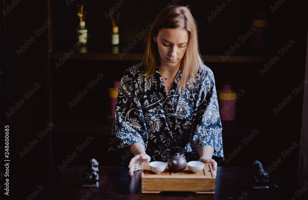 young women making and drink chinese tea ceremony. young women making and drink chinese tea ceremony.
