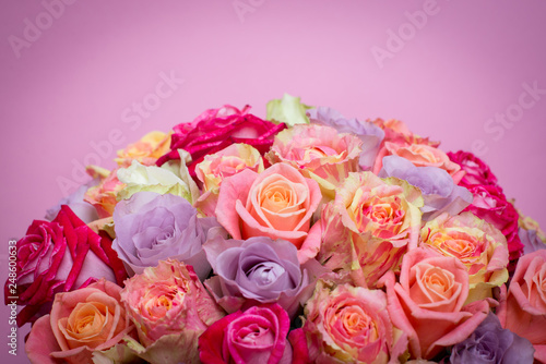 Beautiful bouquet of roses in a gift box. Bouquet of pink roses. Pink roses close-up. on pink background, with space for text. © Alex