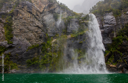 Misty falls at Milford Sound, New Zealand