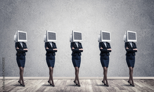 Business women with monitors instead of head.