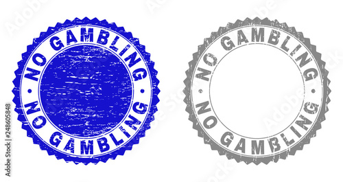 Grunge NO GAMBLING stamp seals isolated on a white background. Rosette seals with grunge texture in blue and gray colors. Vector rubber stamp imitation of NO GAMBLING label inside round rosette.