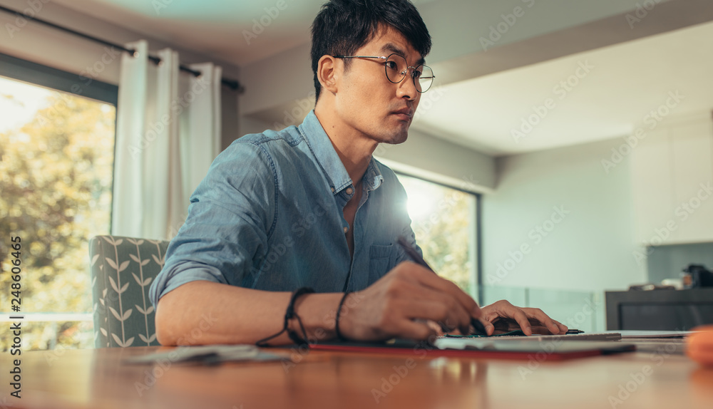 Professional architect working at his desk