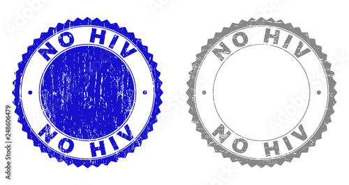 Grunge NO HIV stamp seals isolated on a white background. Rosette seals with distress texture in blue and gray colors. Vector rubber stamp imitation of NO HIV caption inside round rosette.