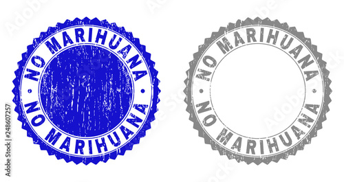 Grunge NO MARIHUANA stamp seals isolated on a white background. Rosette seals with distress texture in blue and grey colors. Vector rubber stamp imitation of NO MARIHUANA text inside round rosette.