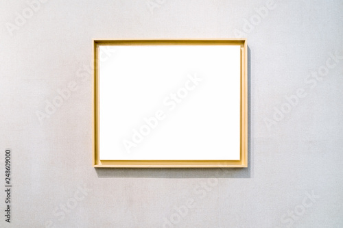 blank picture frame on exhibition wall