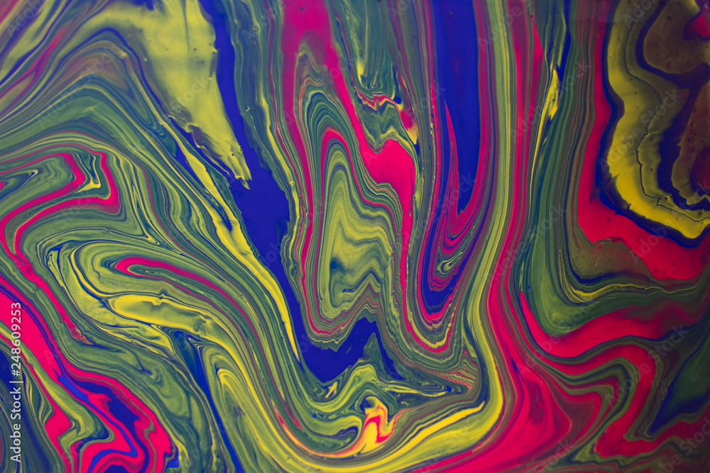 Abstract background with psychedelic vivid colors. Marbleized bright effect with fluid painting, background for wallpapers, poster, postcard. Swirls and lines with yellow, blue, purple and magenta. Abstract background with psychedelic vivid colors. Marbleized bright effect with fluid painting, background for wallpapers, poster, postcard. Swirls and lines with yellow, blue, purple and magenta.