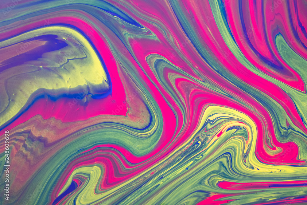 Abstract background with psychedelic vivid colors. Marbleized bright effect with fluid painting, background for wallpapers, poster, postcard. Swirls and lines with yellow, blue, purple and magenta. Abstract background with psychedelic vivid colors. Marbleized bright effect with fluid painting, background for wallpapers, poster, postcard. Swirls and lines with yellow, blue, purple and magenta.