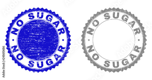 Grunge NO SUGAR stamp seals isolated on a white background. Rosette seals with distress texture in blue and grey colors. Vector rubber stamp imprint of NO SUGAR tag inside round rosette.