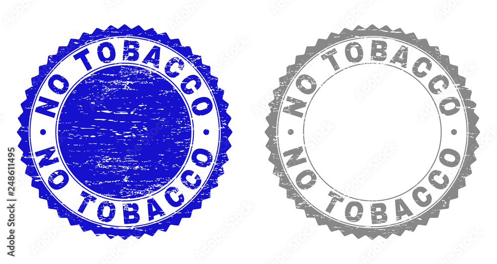 Obraz premium Grunge NO TOBACCO stamp seals isolated on a white background. Rosette seals with grunge texture in blue and grey colors. Vector rubber stamp imitation of NO TOBACCO title inside round rosette.