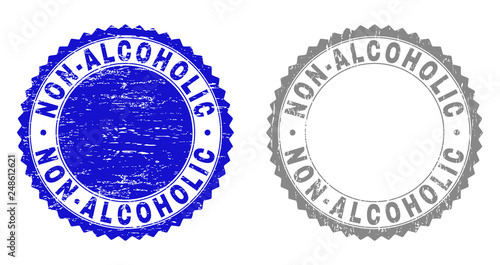 Grunge NON-ALCOHOLIC stamp seals isolated on a white background. Rosette seals with grunge texture in blue and gray colors. Vector rubber watermark of NON-ALCOHOLIC title inside round rosette.