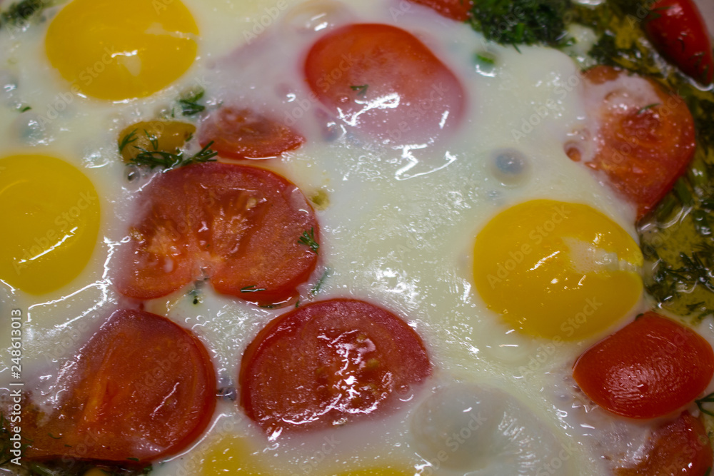 Colorful and healthy Breakfast: eggs with tomato and herbs Colorful and healthy Breakfast: eggs with tomato and herbs