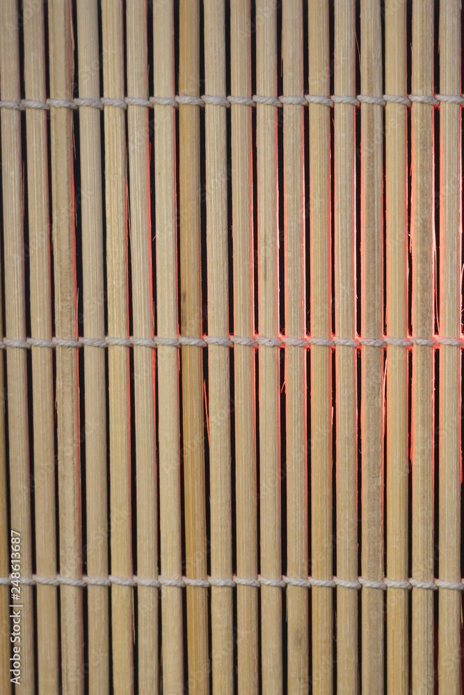 wooden sticks connected by cord wooden sticks connected by cord