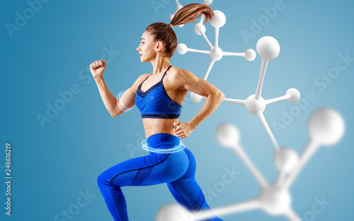 Sporty young woman runing and jumping near molecules.