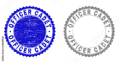Grunge OFFICER CADET stamp seals isolated on a white background. Rosette seals with grunge texture in blue and grey colors. Vector rubber stamp imitation of OFFICER CADET title inside round rosette.
