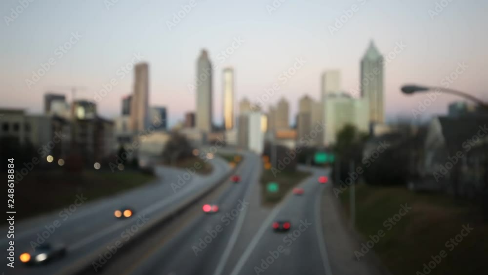 City and car traffic lights. Abstract bokeh lights background of modern city skyline. City and car traffic lights. Abstract bokeh lights background of modern city skyline.