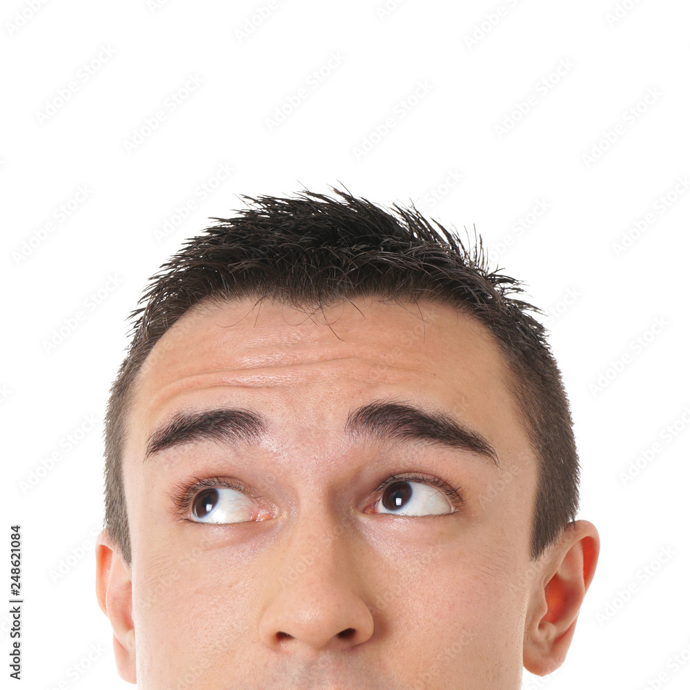 male eyes looking up towards copy space male eyes looking up towards copy space