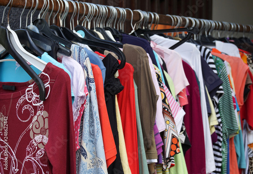 Fotografie 2nd hand sale clothes rack with a selection of fashion for women