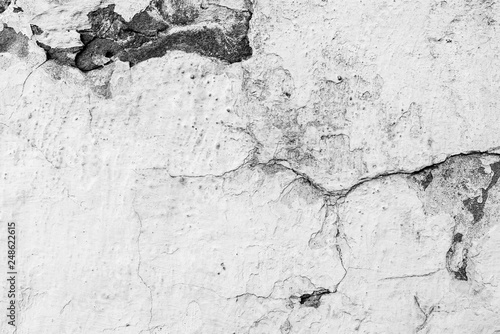 Texture, wall, concrete, it can be used as a background . Wall fragment with scratches and cracks