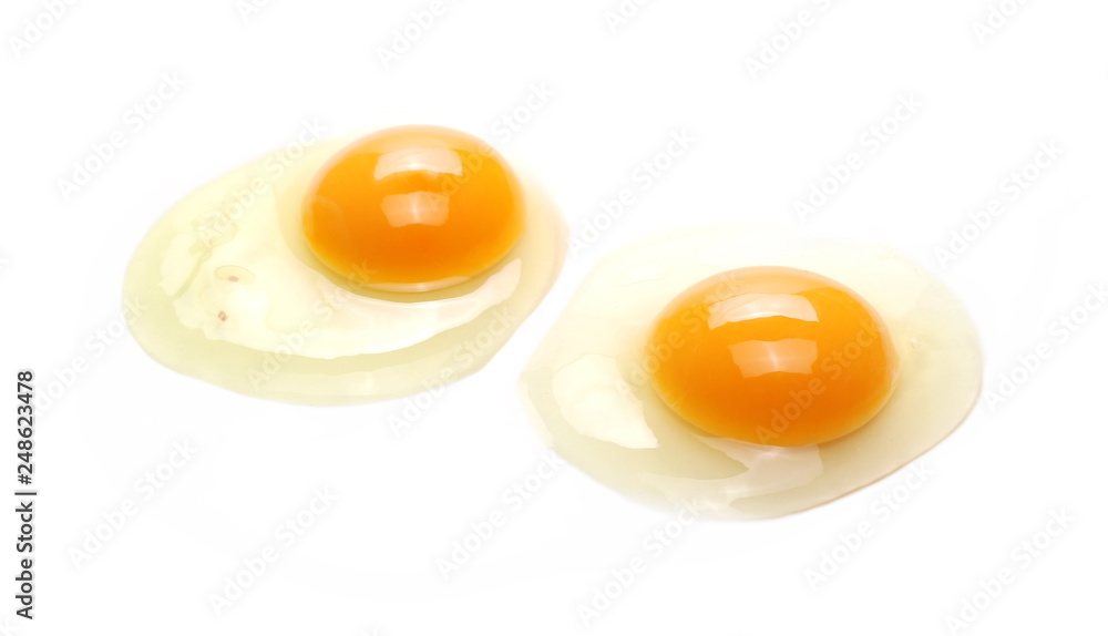 Raw eggs with yolks isolated on white background Raw eggs with yolks isolated on white background