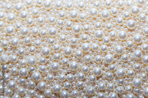 Pearl background. Texture from beads of white pearls photo