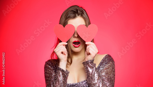 Woman in stylish dress hold symbol love. Romantic mood. Girl in love dating. Obsession concept. Fall in love. Girl adorable fashion model makeup face hold heart valentines card. Love from first sight